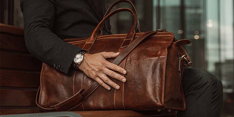 Travel in Style with Durable Leather Duffle Bags and Stay Warm with Premium Leather Gloves for Men